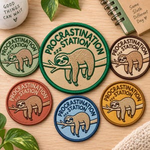 May include: Six circular embroidered patches featuring a sloth hanging on a branch with the text "PROCRASTINATION STATION" and "zzz" above the sloth. The patches come in various background colors including green, tan, brown, red, blue, and yellow.