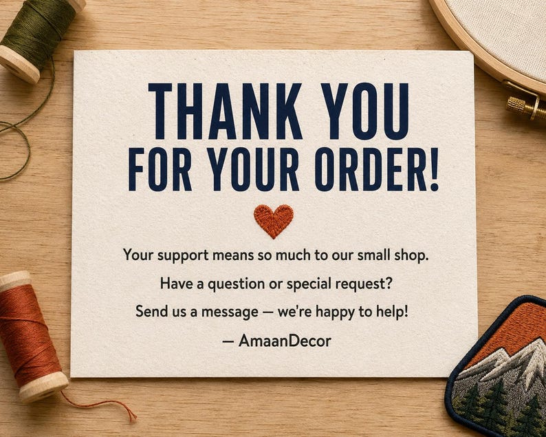 Puede incluir: Una tarjeta rectangular de color blanco roto con texto azul oscuro que dice THANK YOU FOR YOUR ORDER! seguido de un peque&ntilde;o coraz&oacute;n naranja bordado y texto que dice Your support means so much to our small shop. Have a question or special request? Send us a message &mdash; we're happy to help! &mdash; AmaanDecor.