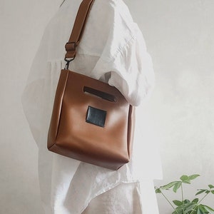 Brown crossbody minimal compact mini shoulder bag, designer handbag made of pu leather with extensible strap best gift for women