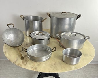 Set of 7 Mid-Century aluminum and copper cooking pots, Italian production, 1930s