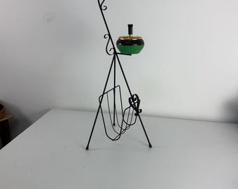 Floor-standing ashtray with magazine rack in enameled wrought iron, 1950s
