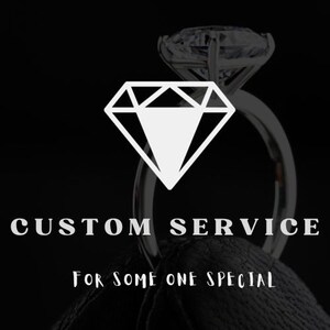 May include: A diamond ring with a large, clear diamond stone. The ring is on a black background with the text "CUSTOM SERVICE FOR SOME ONE SPECIAL".