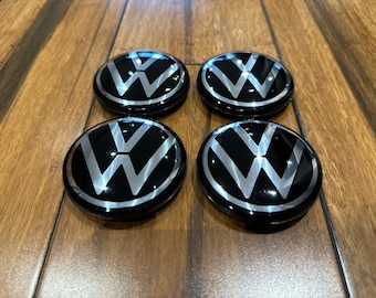 4x Volkswagen naafdoppen voor lichtmetalen velgen voor nieuw model VW - 65 mm