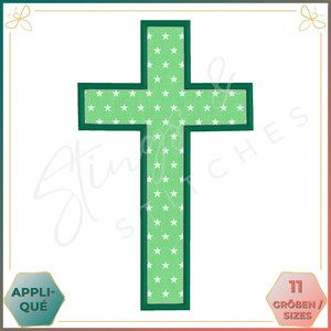 May include: A green cross applique with a white star pattern, outlined in dark green. The design features the text "Stitches" in a script font. The image also includes the text "APPLIQUE" and "11 GRÖBEN / SIZES".