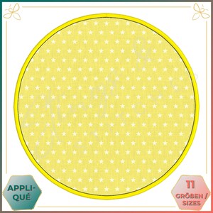 May include: A yellow circle with a white star pattern inside. The circle has a yellow border. The text "11 Größen / Sizes" is in the lower right corner of the image.