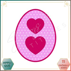 May include: Pink Easter egg with a white star pattern and two pink hearts. The egg is outlined in pink.