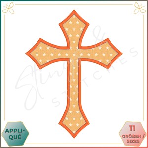 Könnte beinhalten: Orangefarbenes Kreuz mit weißem Hintergrund und einem Muster aus kleinen weißen Sternen. Das Kreuz ist orange umrandet.