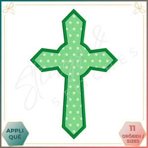 May include: Green cross with a white star pattern. The cross has a thick green outline.