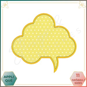 May include: A yellow cloud-shaped design with a white star pattern, outlined in gold. The design includes a speech bubble and the text "APPLIQUÉ" and "11 GRÖBEN / SIZES".