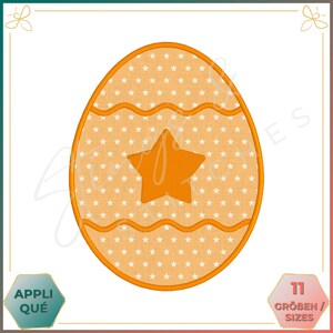 May include: An orange Easter egg design with a star in the centre and a wavy pattern. The egg is filled with small white stars. The word "APPLIQUÉ" is in a teal hexagon, and "11 GRÖBEN / SIZES" is in a pink hexagon.