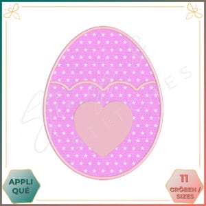 May include: Pink Easter egg embroidery design with a white star pattern and a pink heart in the centre. The design is outlined in pink.