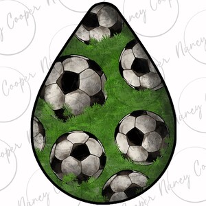 May include: A teardrop-shaped design with a green background and multiple black and white soccer balls. The soccer balls are worn and have a distressed look.