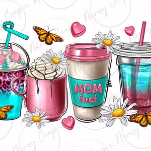 May include: Three colorful drinks with whipped cream and butterflies. The drinks are in clear cups with lids and straws. The middle cup has a pink lid and says "MOM fuel" on the side. The drinks are surrounded by white daisies and pink hearts.