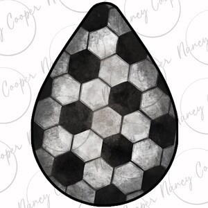 May include: A black and white soccer ball-patterned water droplet-shaped cookie cutter.
