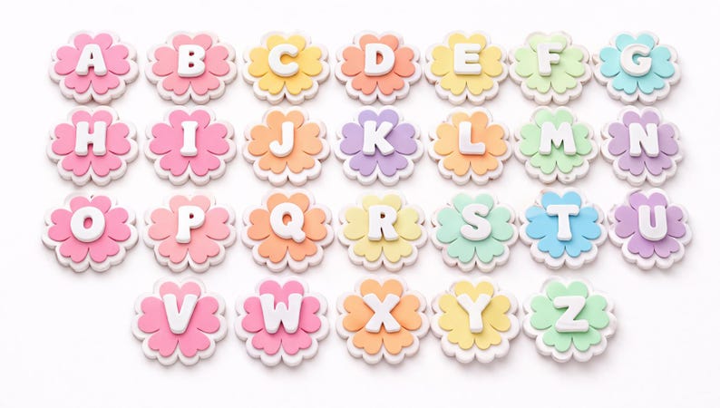May include: A collection of colorful alphabet letters, each shaped like a flower. The letters are white, set against pastel backgrounds of pink, yellow, orange, green, and purple. The letters are arranged in rows and columns.