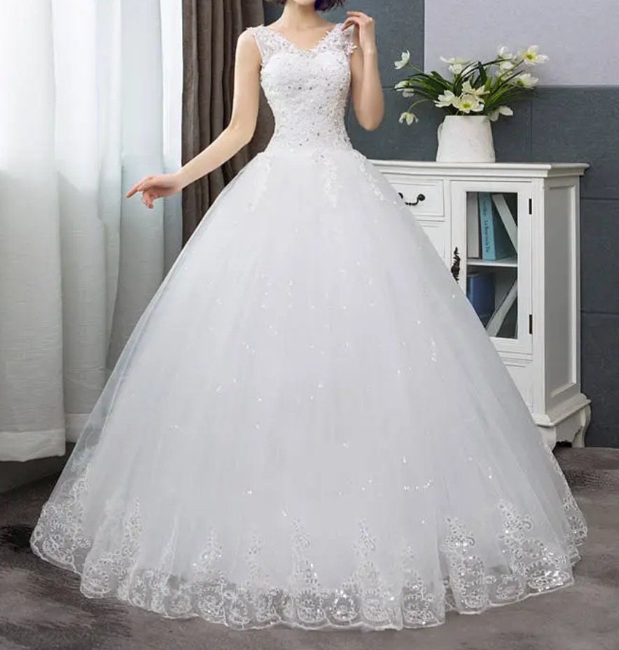 Robe de mariée avec diamant sale