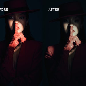 May include: A woman wearing a red hat and a red blazer with a red lace glove covering her hand, holding her finger to her lips as if to say "shhh".