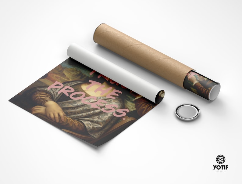 May include: A print of a classic painting with the text "Feel the Progress" in pink. The print is next to a rolled-up poster, a white tube, and a silver button. The print is on a white surface.