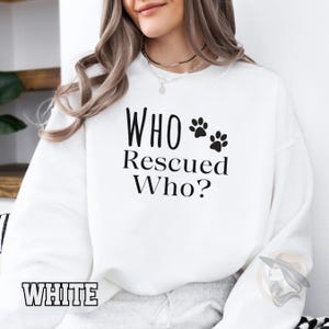 Who Rescued Who? Sweatshirt, Rescue Dog Lover Crewneck, Adopted dog paw print, Cozy Pet sweatshirt, PetLover Apparel, Paw Print Pullover