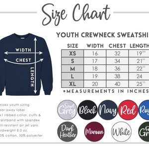May include: Size chart for youth crewneck sweatshirts. The chart shows sizes XS to XL with corresponding width, chest, and length measurements in inches. The chart is accompanied by a mock-up of a navy blue sweatshirt with measurements labeled.  The colors available are Sport Grey, Black, Navy, Red, Royal, Dark Heather, Maroon, White, and Forest Green.