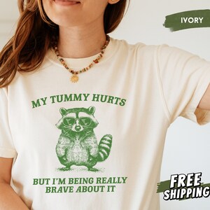 My Tummy Hurts Shirt, Comfort Colors Raccoon Shirt, Tummy Ache Survivor, IBS, Funny Meme Shirt, Trash Panda, Weird Gifts, Silly Shirt