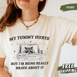 My Tummy Hurts Shirt, Comfort Colors Raccoon Shirt, Tummy Ache Survivor, IBS, Funny Meme Shirt, Trash Panda, Weird Gifts, Silly Shirt
