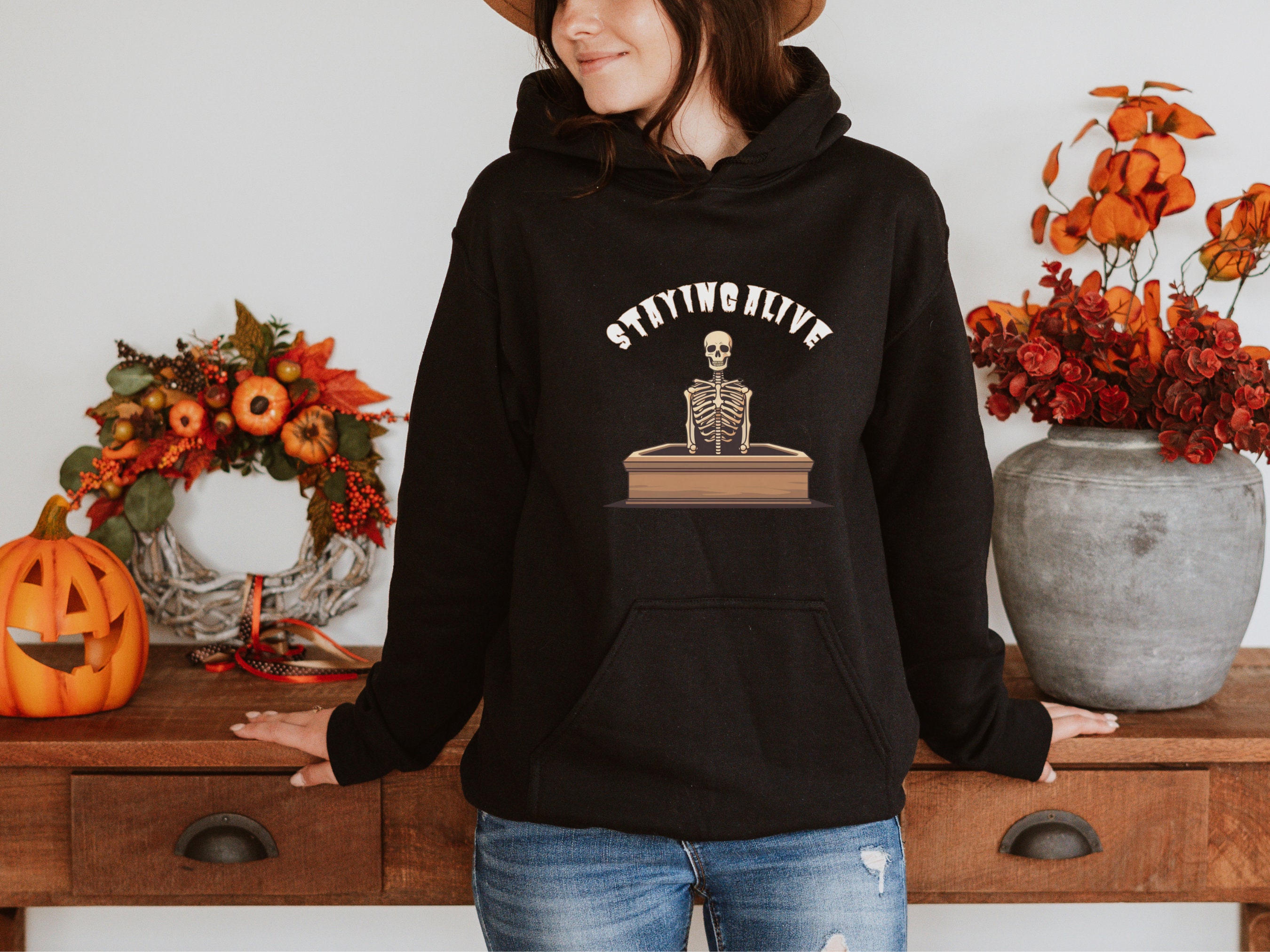 Discover Halloween Skeleton Hoodie, Funny Hooded Sweatshirt, Staying Alive, Spooky Season Sweater, Cute Halloween Coffin, Gift for Him Her, Unisex