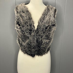 Vintage Love Rocks faux fur vest.