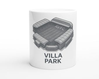 May include: White ceramic mug featuring a detailed illustration of Villa Park stadium. The design includes the stadium's architecture, the text "AVFC" and "VILLA PARK" in gray.