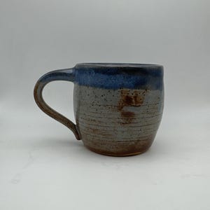 blue mug with black slip inlay