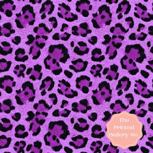 May include: A vibrant, textured pattern featuring a leopard print design. The design showcases black spots over a bright purple background, creating a bold and eye-catching aesthetic. The Printed Gallery Co. logo is in the bottom right corner.