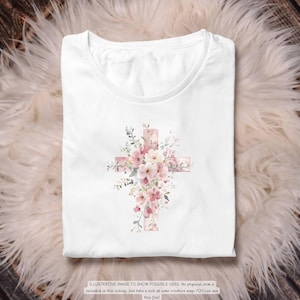 以下が含まれることがあります： 水彩画の十字架のデザインが特徴の白いTシャツ。十字架はピンクとピーチ色の花と緑の葉で飾られています。下部のテキストは次のとおりです：可能な用途を示すためのイラスト画像。このリストには物理的なアイテムは含まれていませんが、このファイルをYOUが使用できるいくつかの創造的な方法をご覧ください！