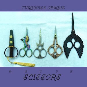 May include: Five decorative scissors with different designs. The scissors are labeled A through E. The scissors are on a white fabric background. The text "TURQUOISE OPAQUE" is at the top of the image. The text "SCISSORS" is at the bottom of the image.