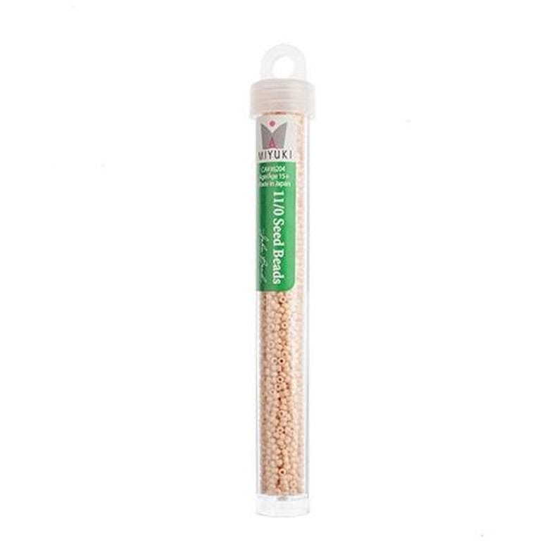 May include: A small clear tube filled with 11/0 size seed beads in a light beige color. The tube has a green label with the text "MIYUKI 11/0 Seed Beads" and a pink flower logo.