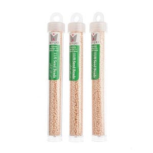 May include: Three clear plastic tubes filled with small, light beige seed beads. Each tube has a green label with the text "MIYUKI 11/0 Seed Beads".