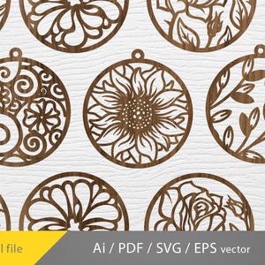 May include: A collection of brown circular laser-cut designs featuring floral and botanical patterns including sunflowers, roses, and swirling leaves. Each circular piece has a small loop at the top. The image includes the text Digital file AI / PDF / SVG / EPS vector.