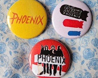 Juego Phoenix de tres insignias de pin de botón de 25 mm (1 pulgada), que incluye un diseño inspirado en el álbum 'Wolfgang Amadeus Phoenix'.