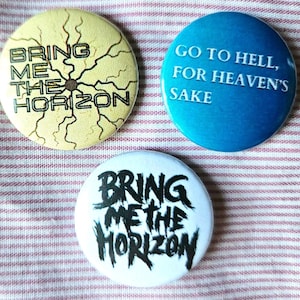 Bring Me The Horizon set of three 25mm (1 inch) button pin badges with exclusive designs.