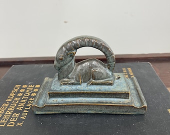 American Encaustic Tiling Co Ram paperweight