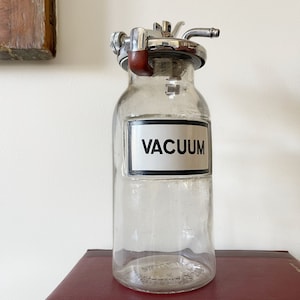 Antique medical vacuum pump bottle