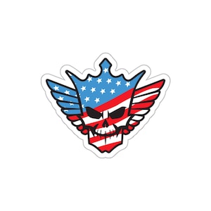 May include: A sticker featuring a skull with a crown and wings, incorporating the American flag design. The crown and wings are blue with white stars, and the skull has red and white stripes.