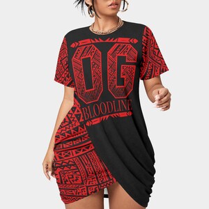 May include: Black and red graphic print dress with the text "OG BLOODLINE". The dress features a unique asymmetrical design with short sleeves and a draped skirt. The red print includes tribal patterns.