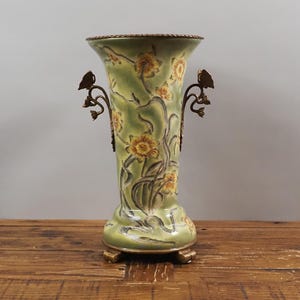 Porcelain Vase with Noble Bronze and Butterfly Motif – The Elegance of Nature and Art good idea for a gift