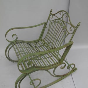Charming Rustic Green Iron Rocking Chair with Classic Design, Perfect for Cozy Outdoor and Indoor Spaces