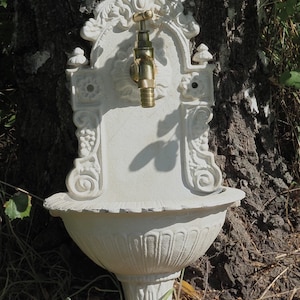 Sleek Iron Wall Fountain: Contemporary Outdoor Water Feature for Garden, Patio, or Indoor Decor