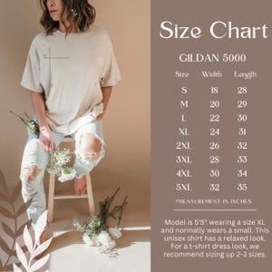 May include: A beige Gildan 5000 unisex t-shirt with a size chart. The chart lists sizes S to 5XL, with measurements in inches. The model is wearing an XL. The shirt has a relaxed fit. The image includes text.