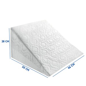 May include: White wedge pillow with a quilted pattern, measuring 28 inches by 50 inches by 46 inches.