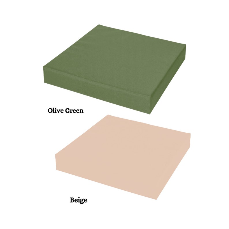 May include: Two square cushions, one olive green and one beige.