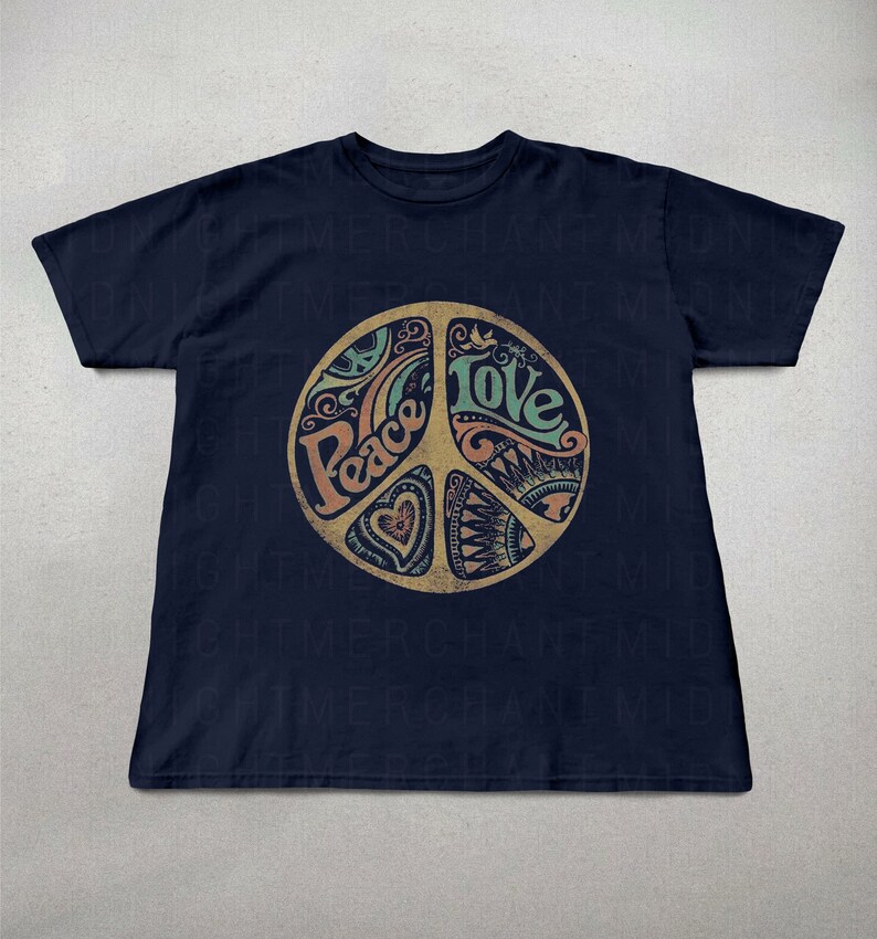 May include: A navy blue t-shirt with a peace sign graphic. The peace sign is filled with colorful designs and the words "Peace" and "Love" are written inside the symbol.