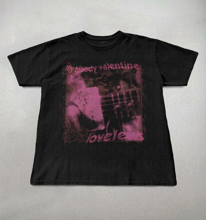 May include: Black t-shirt featuring a pink and black graphic design. The design includes the text "my bloody valentine" above the word "loveless". The graphic appears to be a photograph of a guitar.